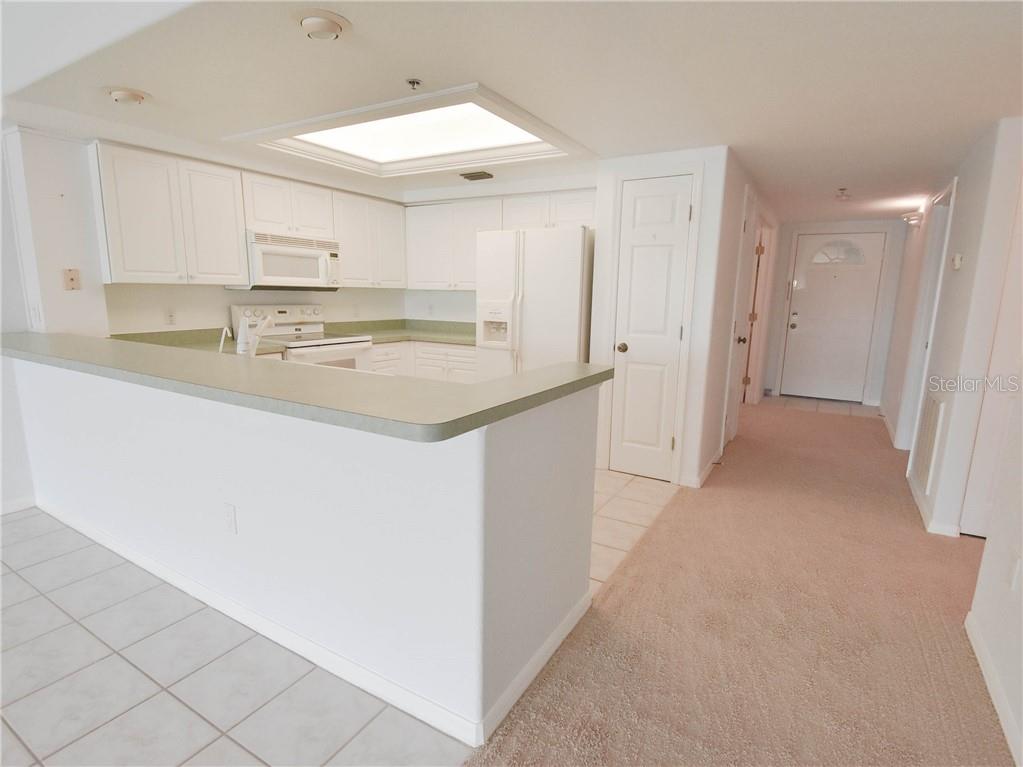 9357 Blind Pass Road, Unit 203 St. Pete Beach, FL 33706 - Photo 12 of 38 Gallery Image 12