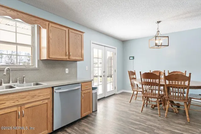 an aerial view of a house with swimming pool