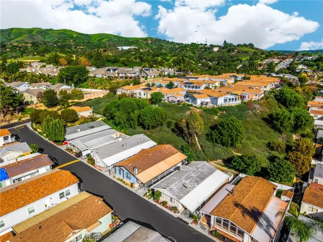 an aerial view of a house with a garden