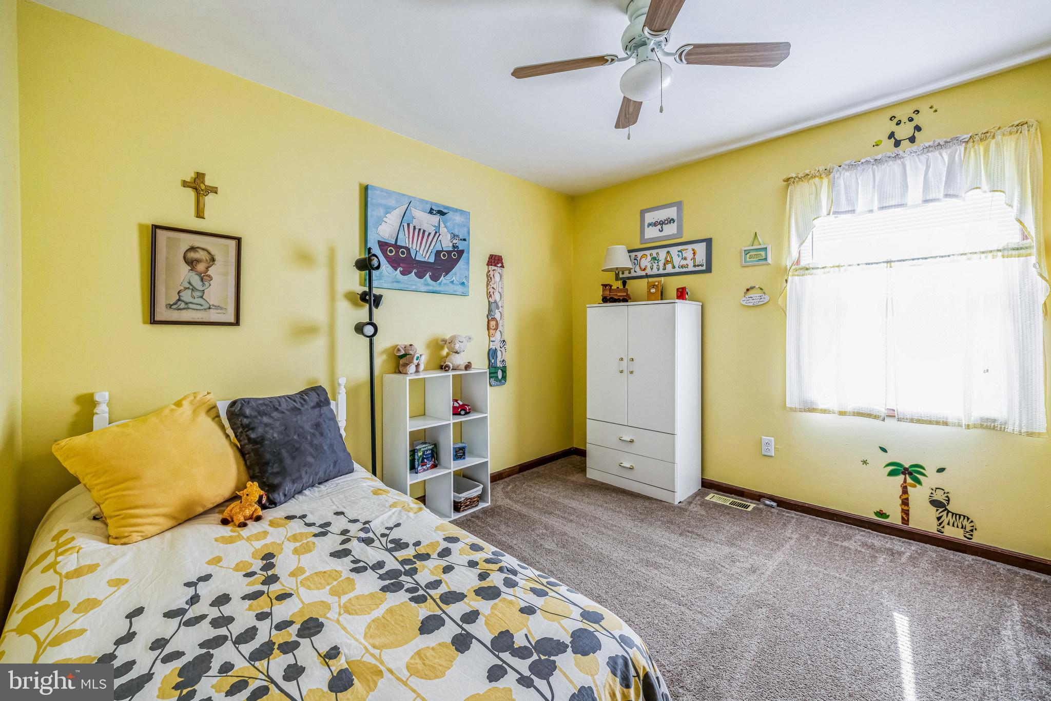 415 Doerrmann Drive Mickleton, NJ 08056 - Photo 24 of 38 a bedroom with a bed and a dresser
