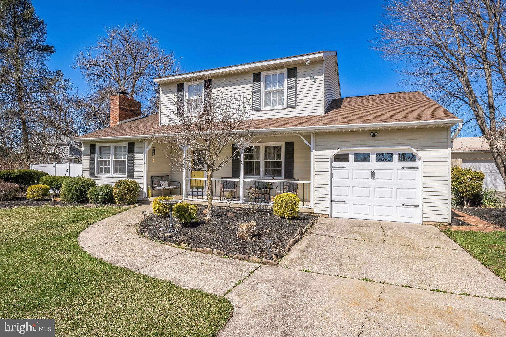415 Doerrmann Drive Mickleton, NJ 08056 - Photo 3 of 38 a front view of a house with garden