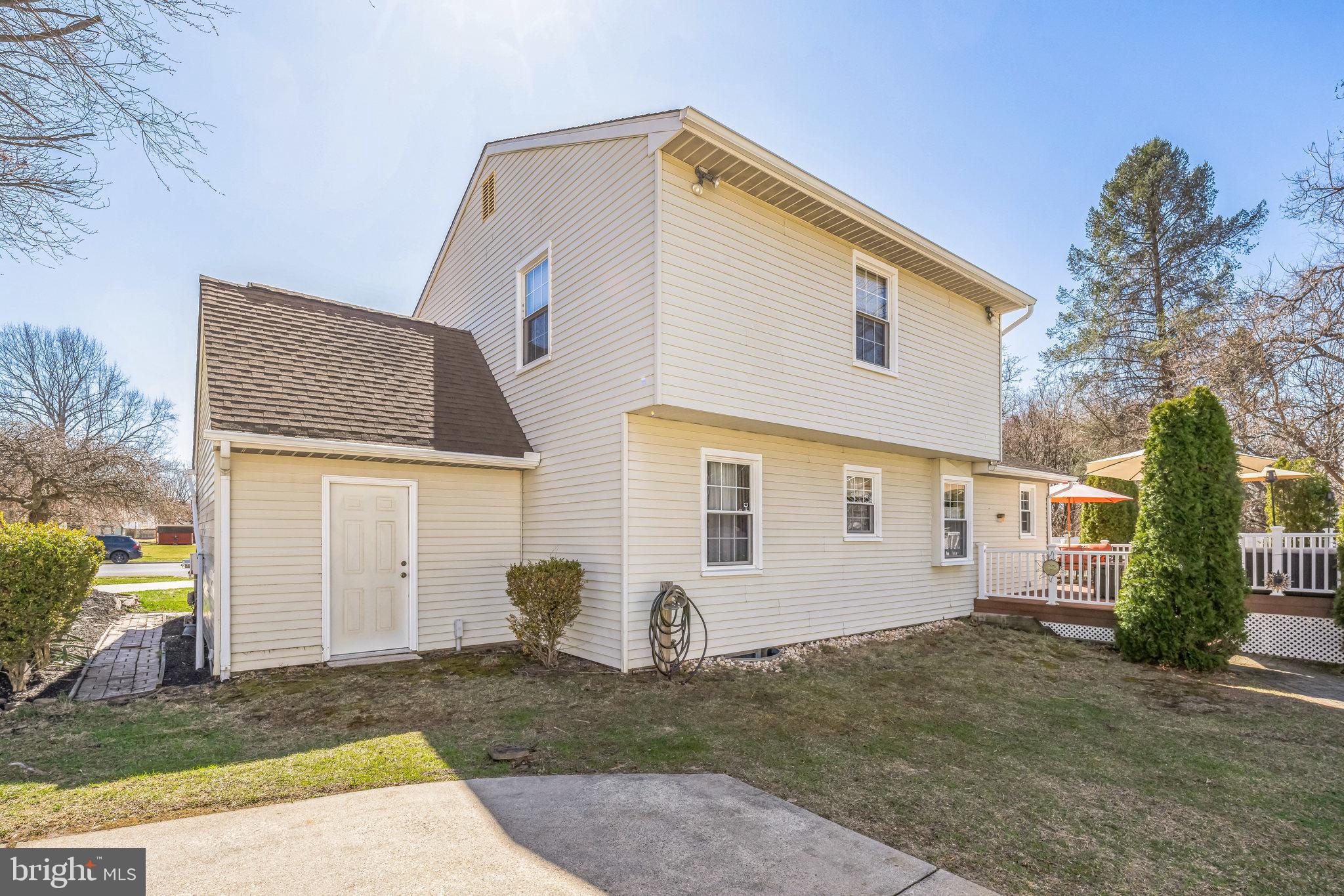 415 Doerrmann Drive Mickleton, NJ 08056 - Photo 35 of 38 a view of a white house with a yard and garage