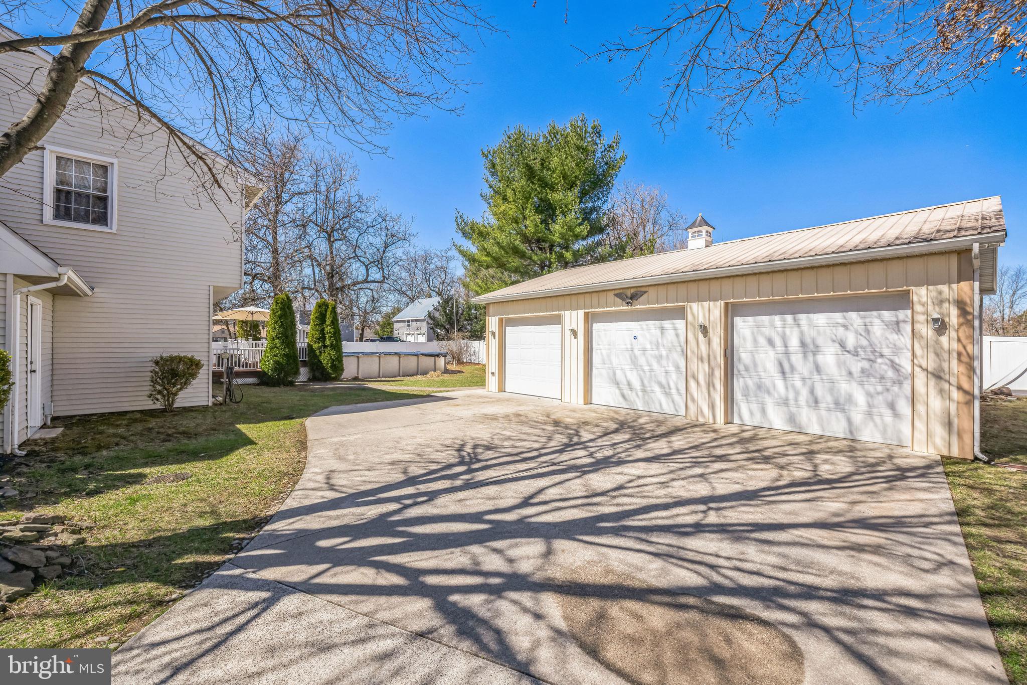 415 Doerrmann Drive Mickleton, NJ 08056 - Photo 37 of 38 a view of a house with a patio