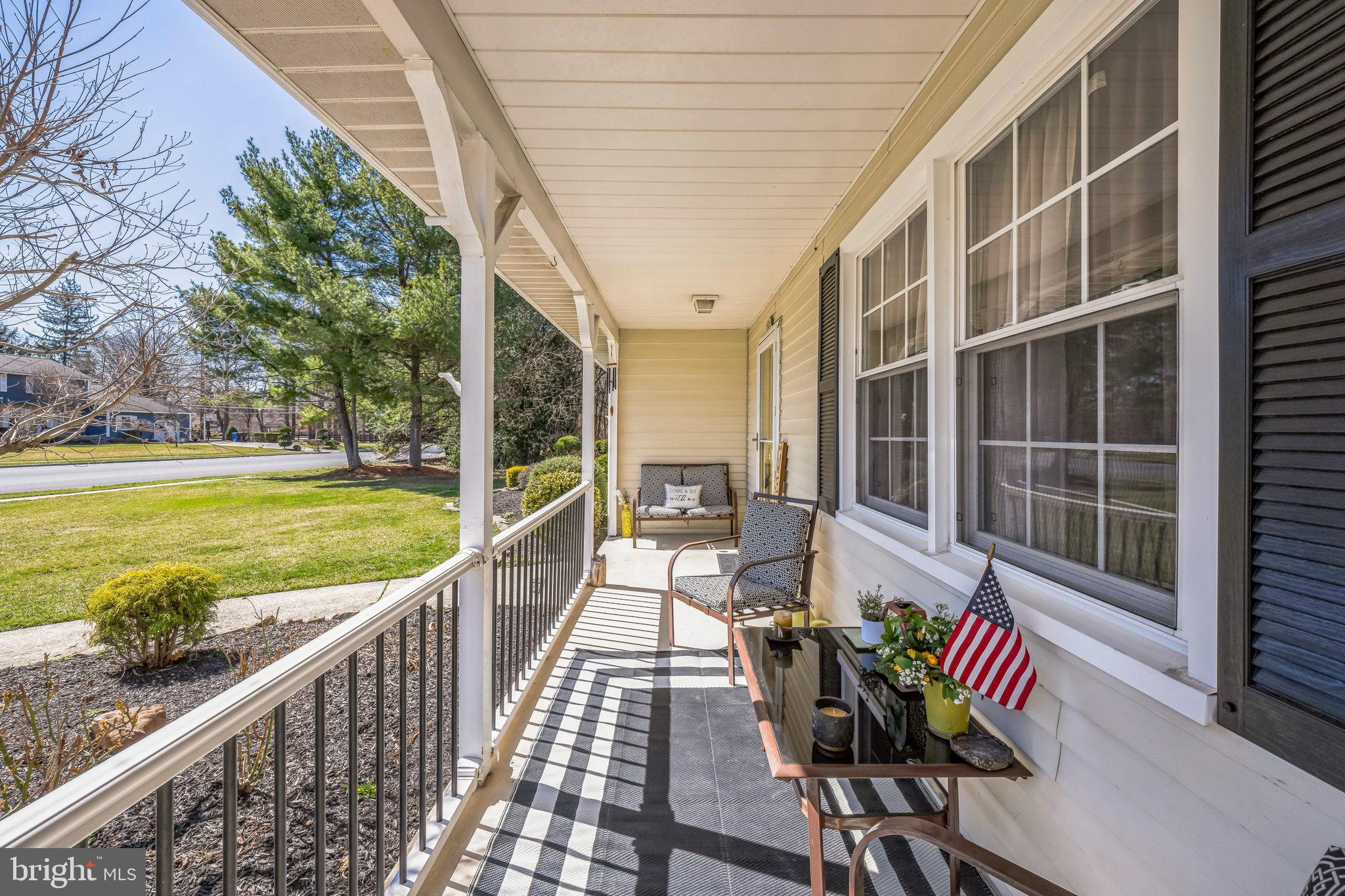 415 Doerrmann Drive Mickleton, NJ 08056 - Photo 5 of 38 a view of balcony with wooden floor and outdoor seating