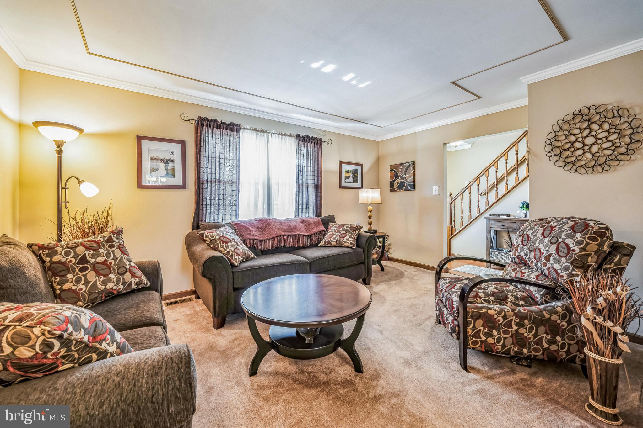 415 Doerrmann Drive Mickleton, NJ 08056 - Photo 7 of 38 a living room with furniture and a couch