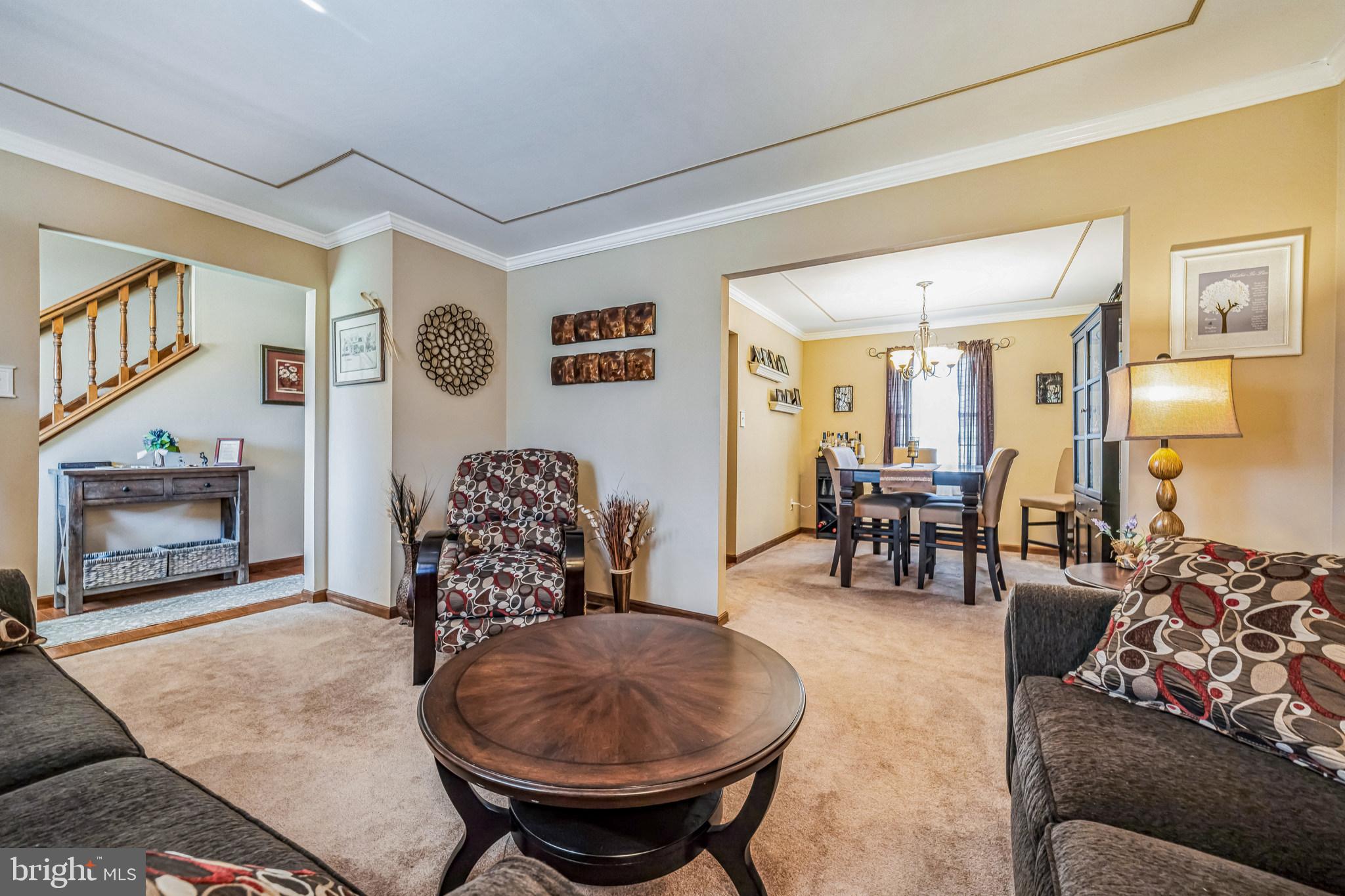 415 Doerrmann Drive Mickleton, NJ 08056 - Photo 9 of 38 a living room with furniture and a fireplace