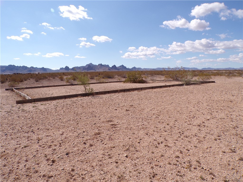 3821 Muscovite Road Golden Valley, AZ 86413 - Photo 8 of 29 a view of lake and mountain