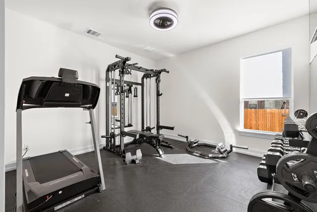a view of a room with gym equipment
