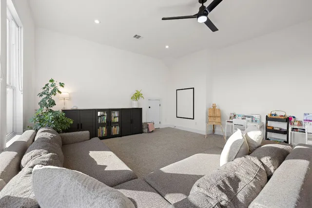 a living room with furniture and a couch