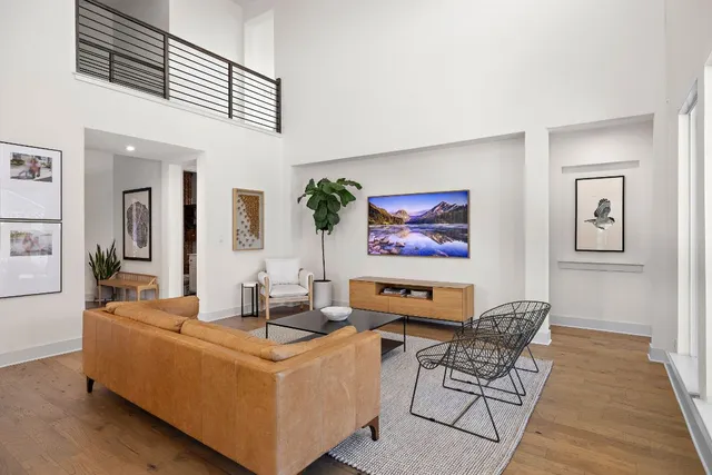a living room with furniture and a table