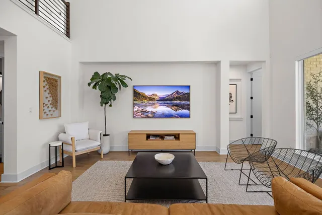 a living room with furniture and a rug