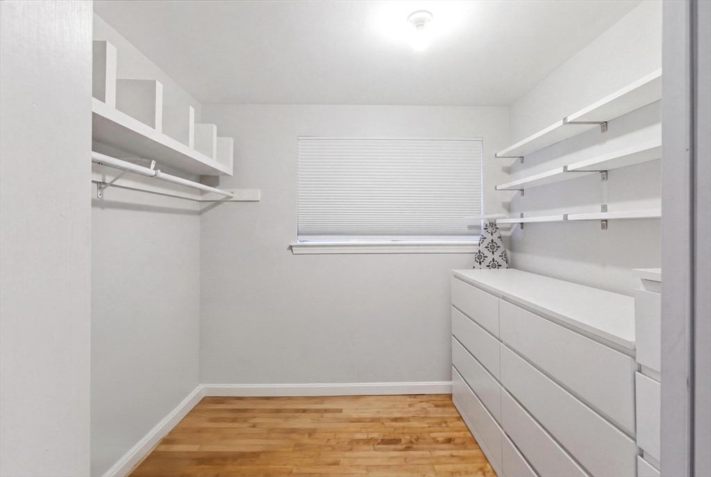 57 Carriage House Path Ashland, MA 01721 - Photo 12 of 37 a view of a room with racks on the wall