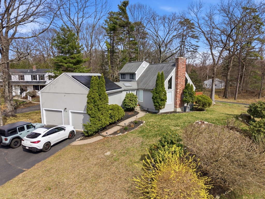 57 Carriage House Path Ashland, MA 01721 - Photo 20 of 37 a view of backyard with parked car