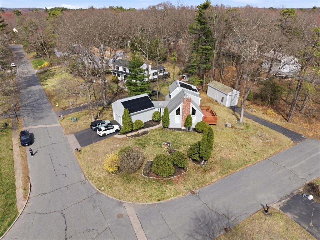 57 Carriage House Path Ashland, MA 01721 - Photo 25 of 37 an aerial view of a house with a yard