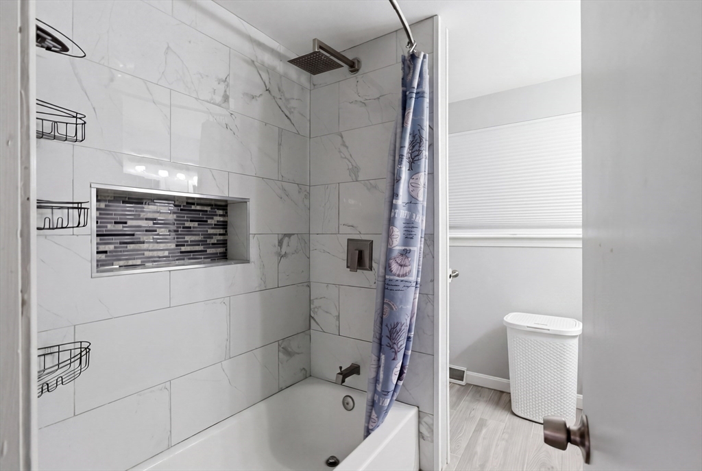 57 Carriage House Path Ashland, MA 01721 - Photo 7 of 37 a bathroom with a toilet and shower