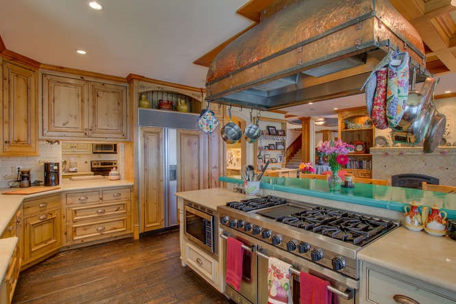 8217 Meeks Bay Avenue Meeks Bay, CA 96142 - Photo 6 of 14 a kitchen with stainless steel appliances granite countertop a stove and a refrigerator
