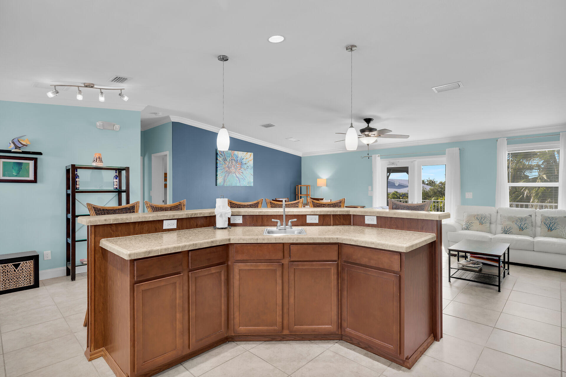 415 Sombrero Beach Road Marathon, FL 33050 - Photo 16 of 41 a kitchen with a sink stove and cabinets