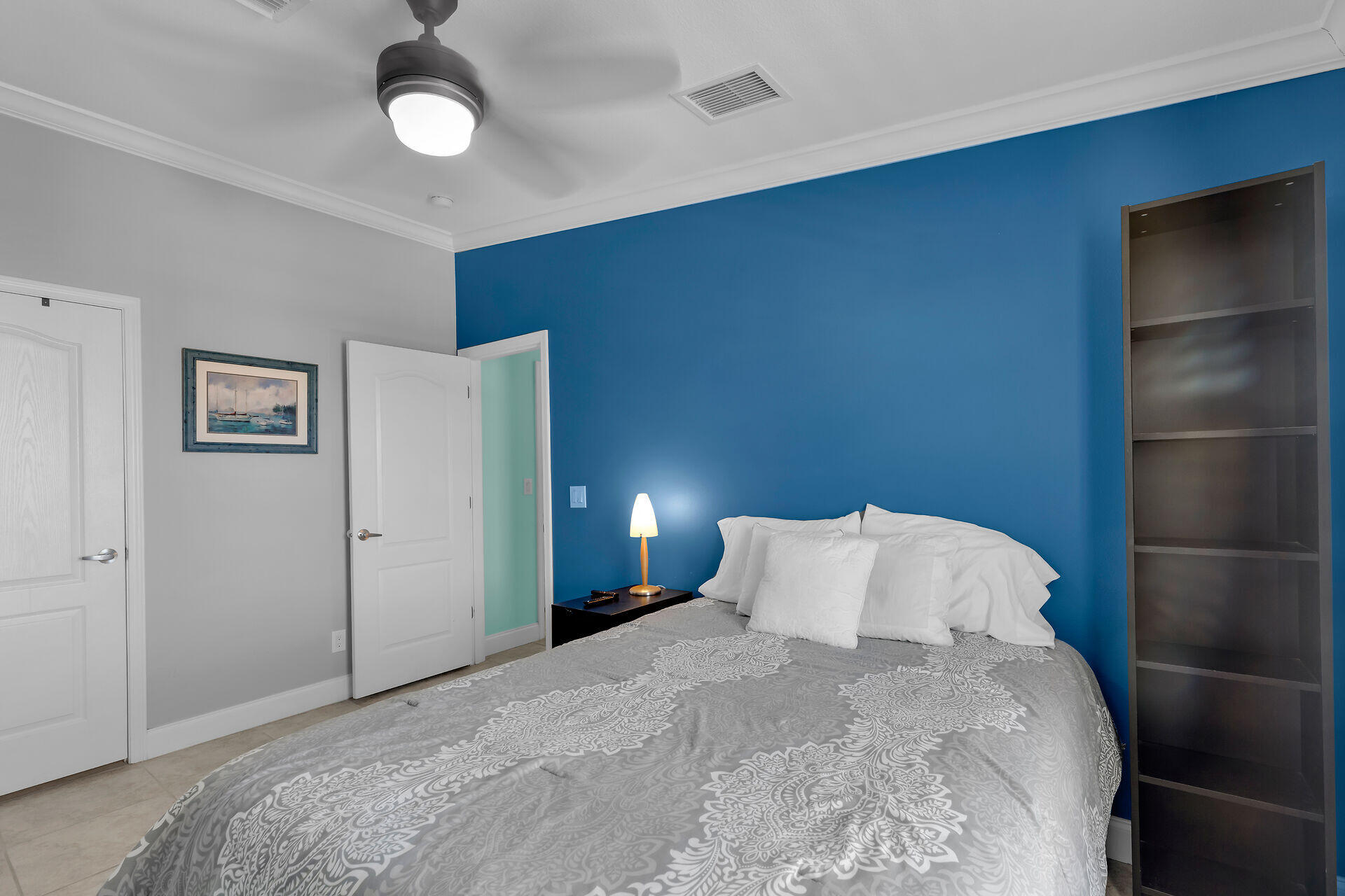 415 Sombrero Beach Road Marathon, FL 33050 - Photo 25 of 41 a large bed sitting in a bedroom and closet