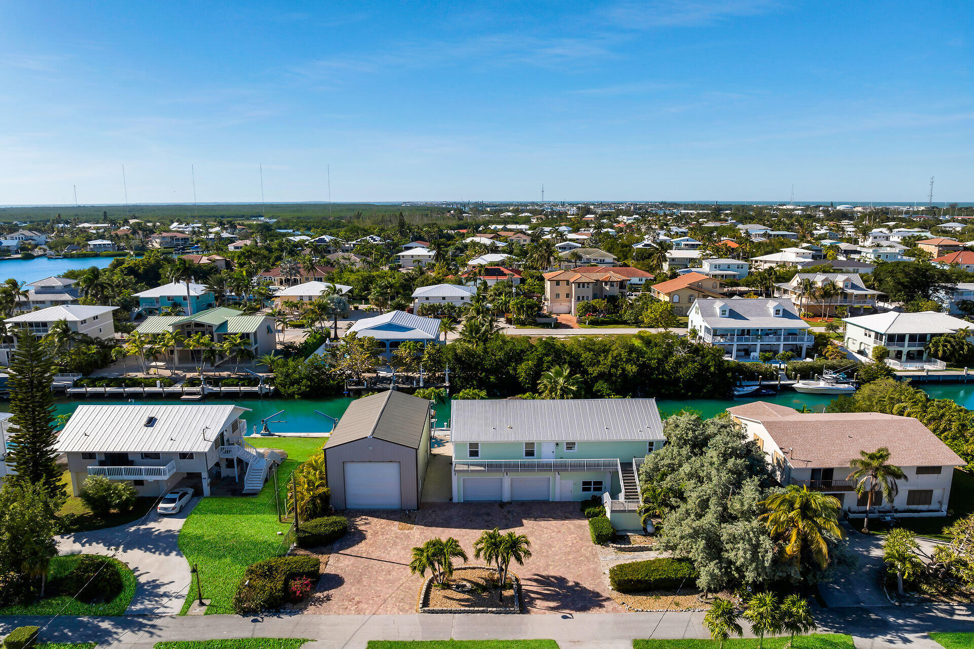 415 Sombrero Beach Road Marathon, FL 33050 - Photo 9 of 41 an aerial view of a house with a garden