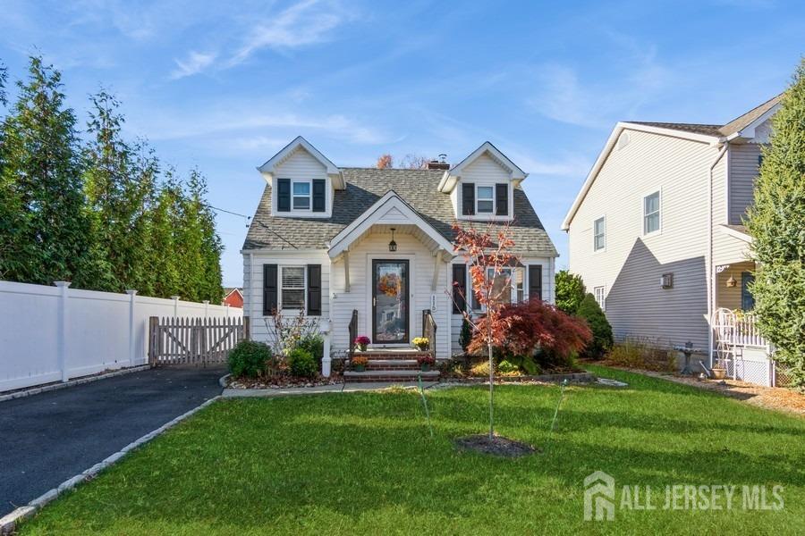 115 Midfield Road Colonia, NJ 07067 - Photo 1 of 25 a front view of house with yard and green space