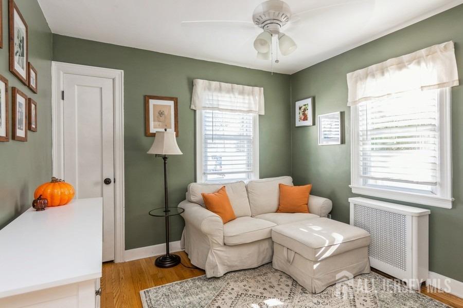 115 Midfield Road Colonia, NJ 07067 - Photo 13 of 25 a living room with furniture and a window