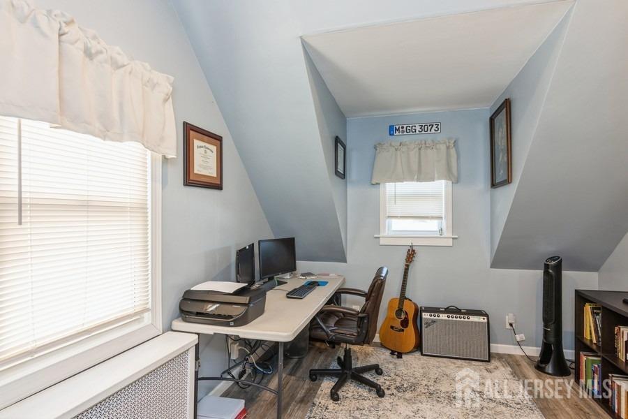 115 Midfield Road Colonia, NJ 07067 - Photo 19 of 25 a view of a workspace with furniture and a window