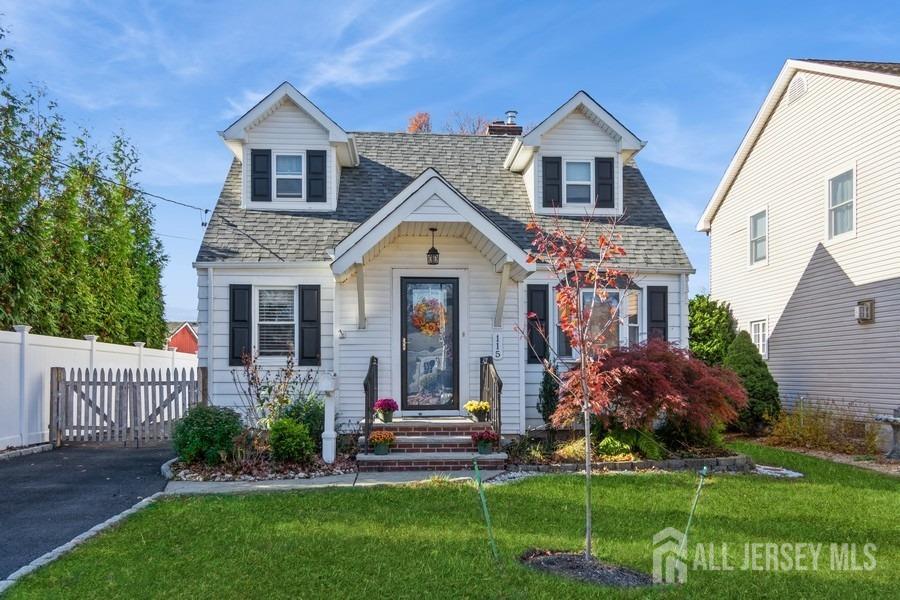 115 Midfield Road Colonia, NJ 07067 - Photo 2 of 25 a front view of a house with a yard