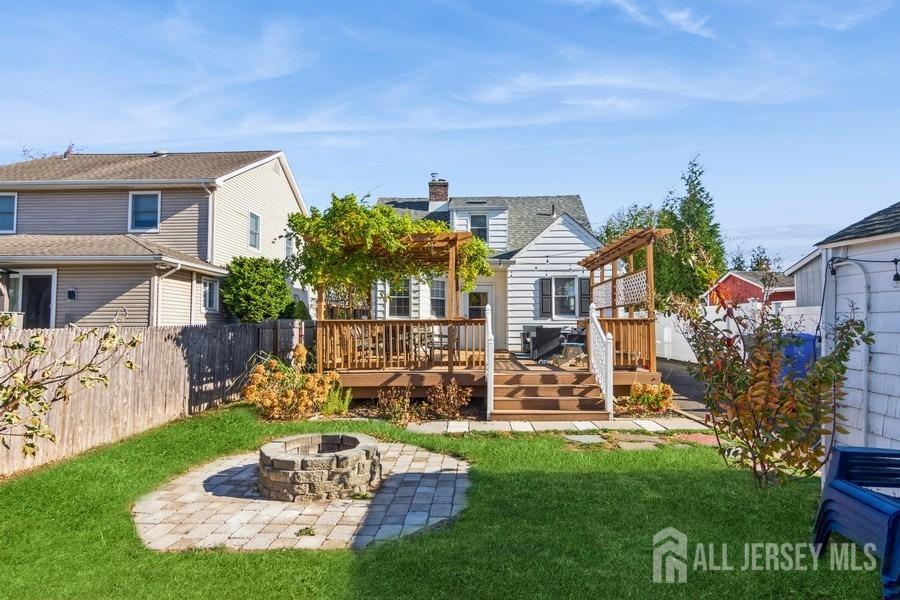 115 Midfield Road Colonia, NJ 07067 - Photo 24 of 25 a view of a house with a yard porch and sitting area