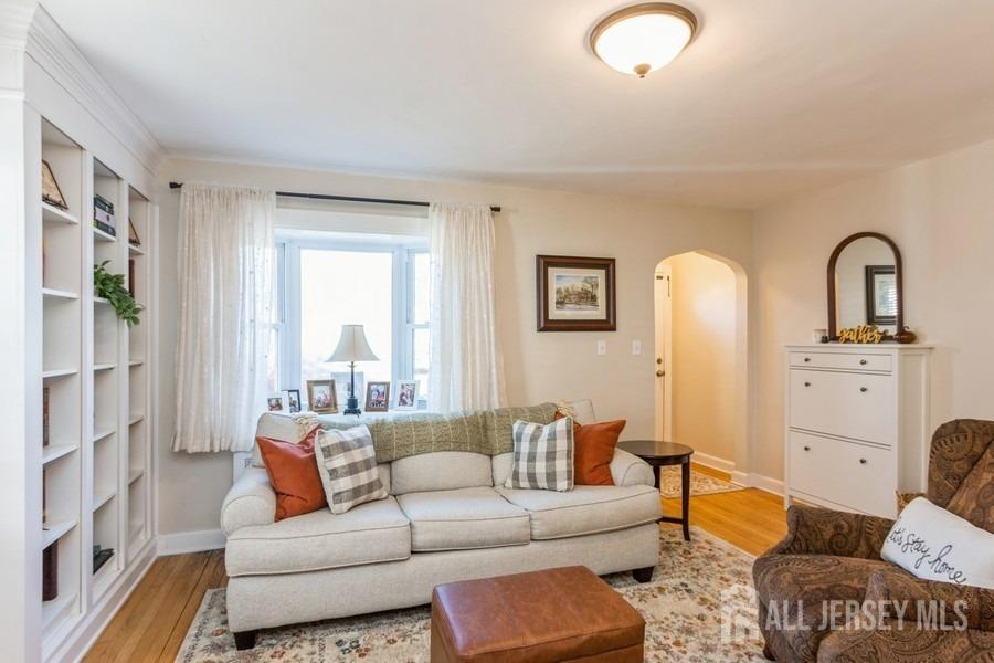 115 Midfield Road Colonia, NJ 07067 - Photo 3 of 25 a living room with furniture and a window