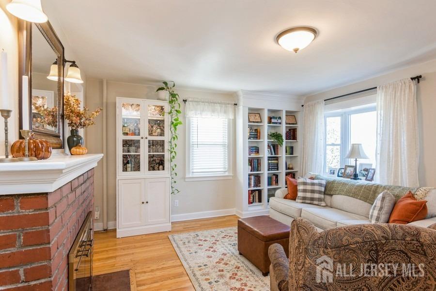 115 Midfield Road Colonia, NJ 07067 - Photo 5 of 25 a living room with furniture and a window