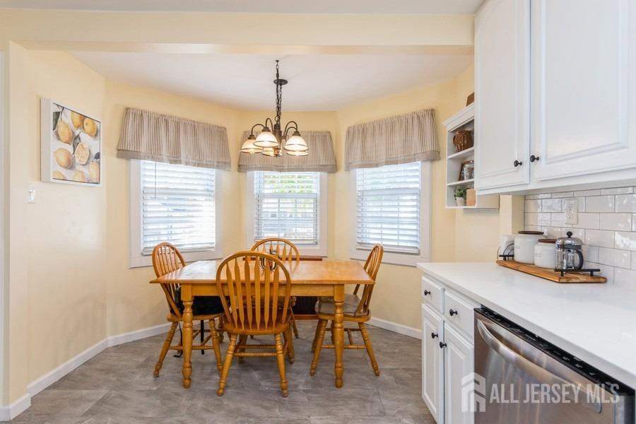 115 Midfield Road Colonia, NJ 07067 - Photo 8 of 25 a view of a dining room with furniture