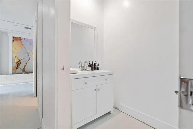 a bathroom with a bathtub and shower