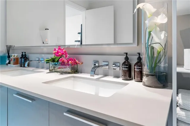 a spacious bedroom with a bed and a window