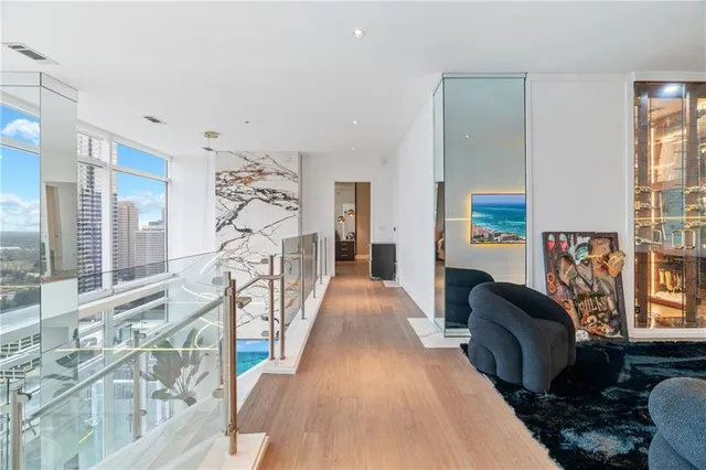 a kitchen with stainless steel appliances granite countertop a stove microwave and cabinets