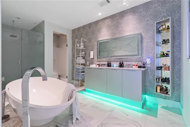 a view of a balcony with chairs and wooden floor