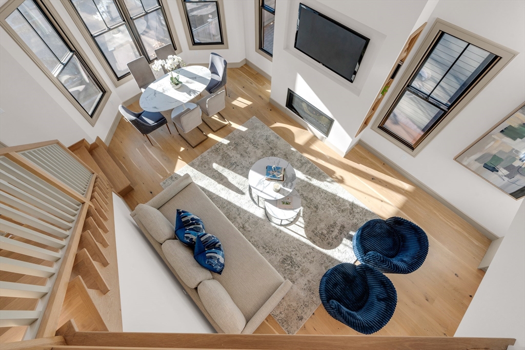 151 Mason Terrace, Unit 2 Brookline, MA 02446 - Photo 15 of 21 a view of living room with furniture and a fireplace