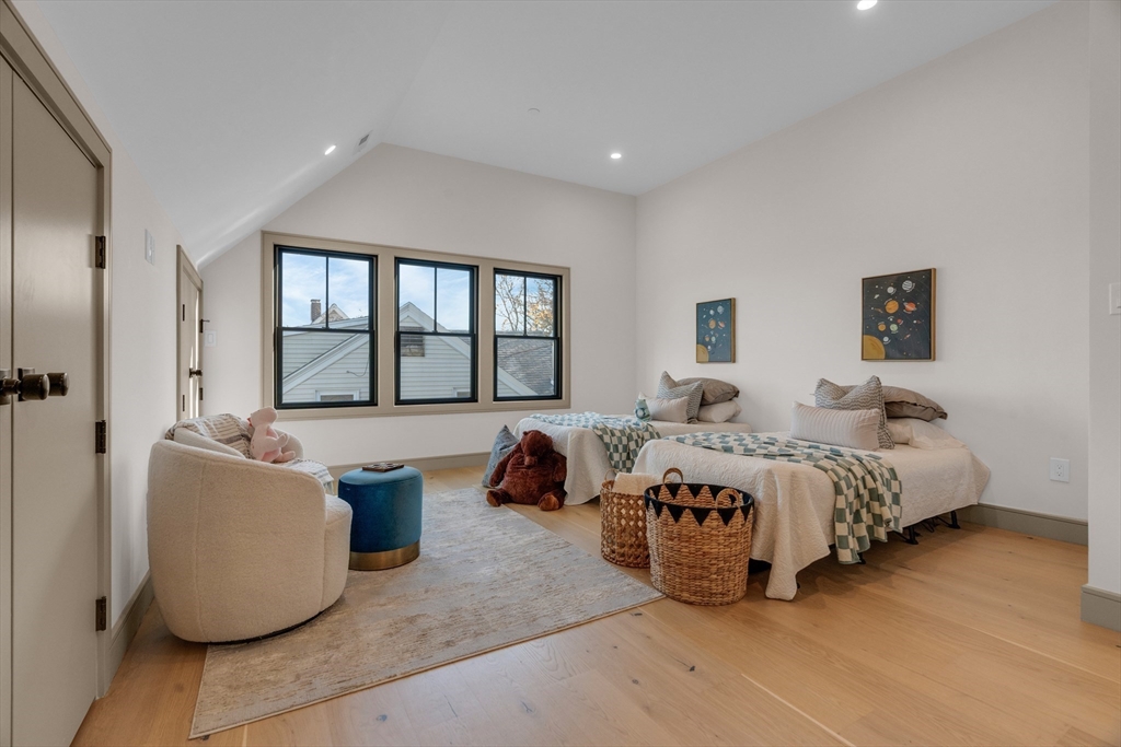 151 Mason Terrace, Unit 2 Brookline, MA 02446 - Photo 20 of 21 a bedroom with bed and window