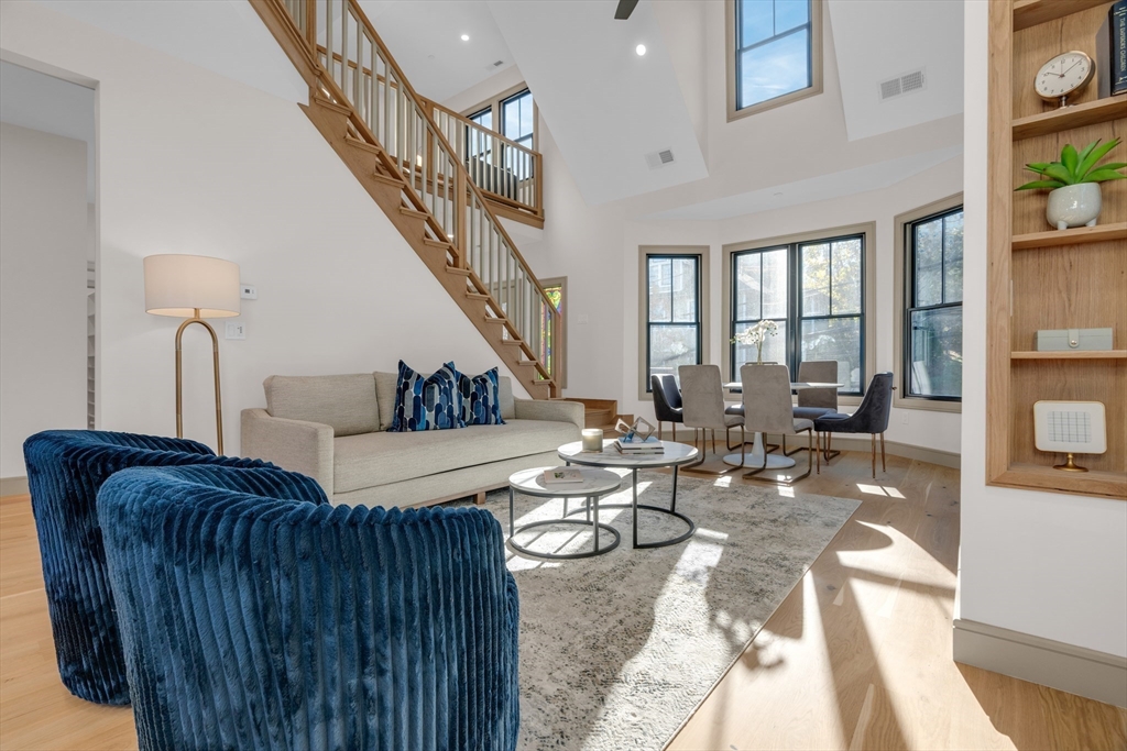 151 Mason Terrace, Unit 2 Brookline, MA 02446 - Photo 2 of 21 a living room with furniture