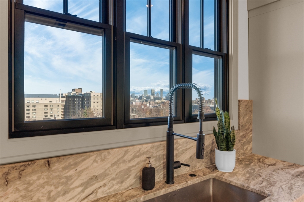 151 Mason Terrace, Unit 2 Brookline, MA 02446 - Photo 7 of 21 a view of water from a window