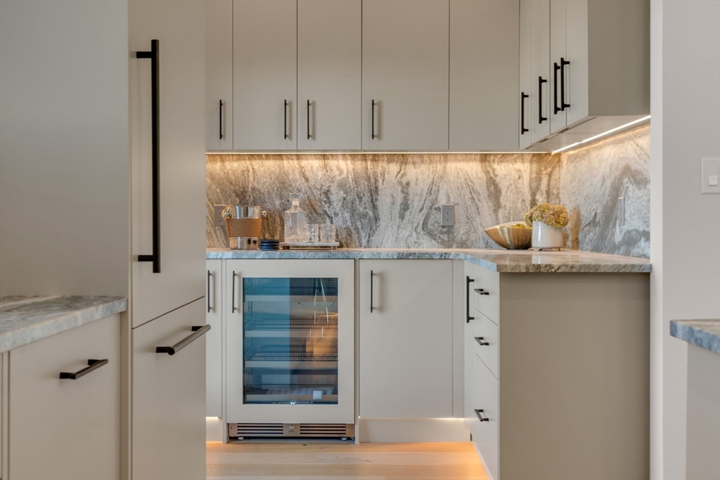 151 Mason Terrace, Unit 2 Brookline, MA 02446 - Photo 8 of 21 a kitchen with a refrigerator and window