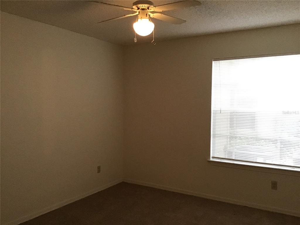 1029 South Hiawassee Road, Unit 2412 Orlando, FL 32835 - Photo 8 of 20 a view of a room that has a window