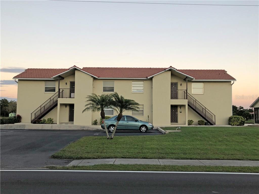 2300 Cooper Street, Unit D2 Punta Gorda, FL 33950 - Photo 1 of 1 a house view with a garden space
