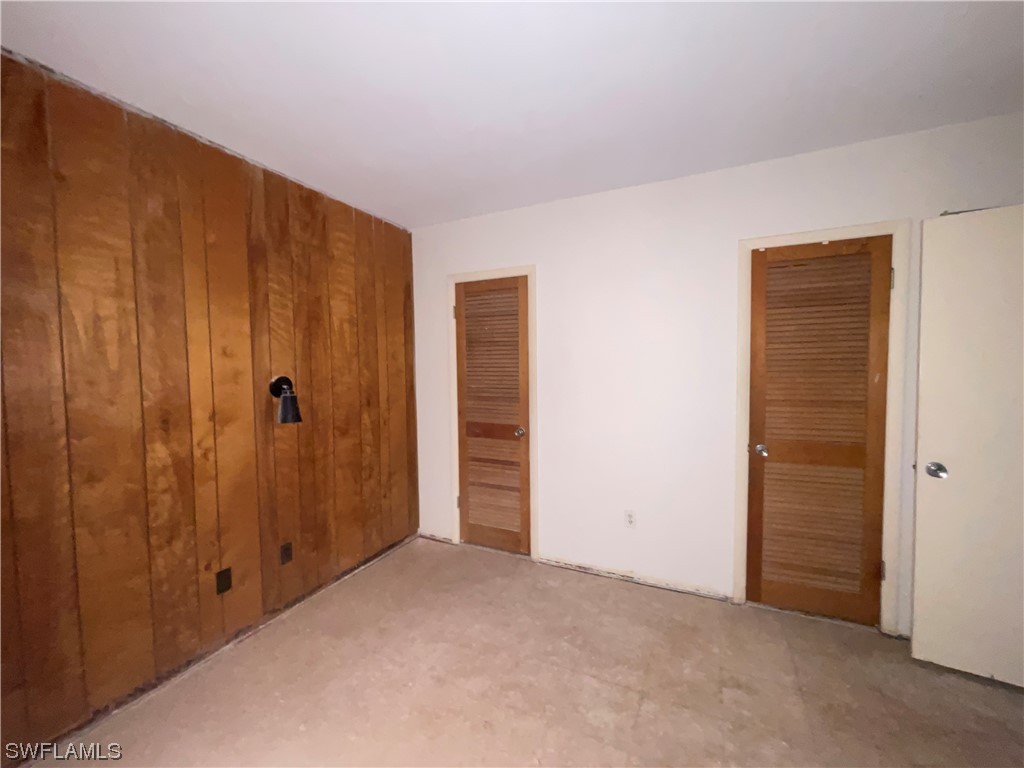 1107 Patterson Road Cape Coral, FL 33909 - Photo 13 of 35 a view of room with walk in closet