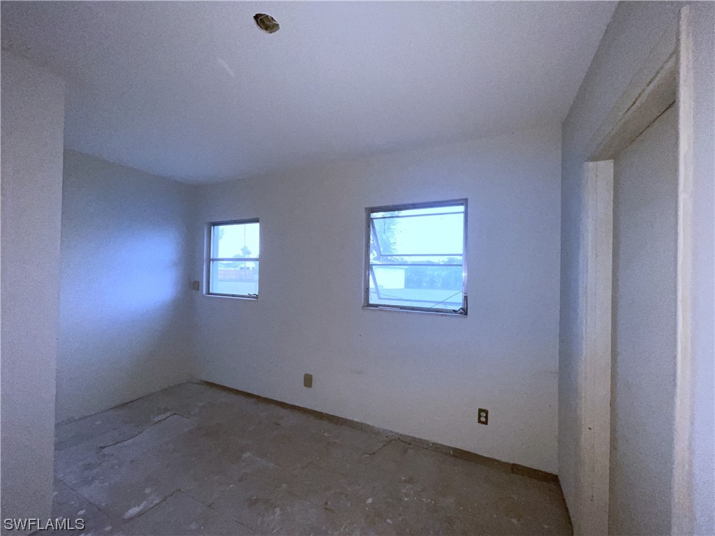 1107 Patterson Road Cape Coral, FL 33909 - Photo 26 of 35 a view of an empty room with a window