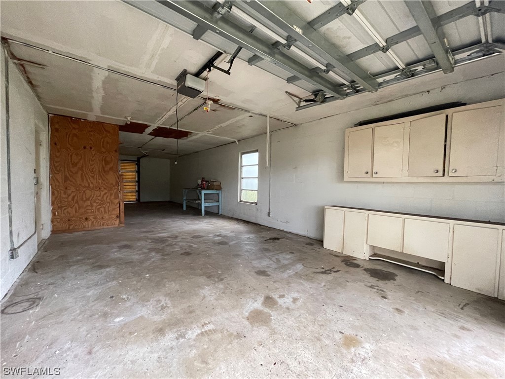 1107 Patterson Road Cape Coral, FL 33909 - Photo 28 of 35 a view of a garage