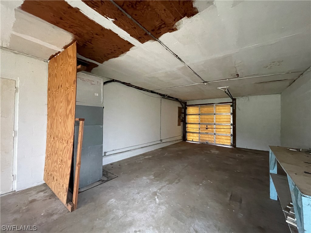 1107 Patterson Road Cape Coral, FL 33909 - Photo 29 of 35 a view of an empty room with window