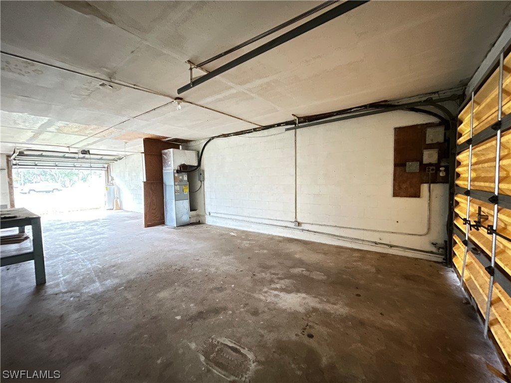 1107 Patterson Road Cape Coral, FL 33909 - Photo 32 of 35 a view of a garage