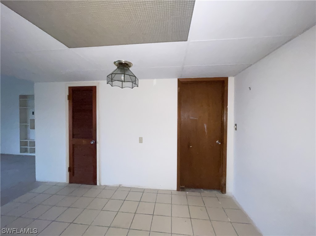 1107 Patterson Road Cape Coral, FL 33909 - Photo 9 of 35 a view of an entryway