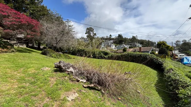 a view of a large body of water with a building in the background