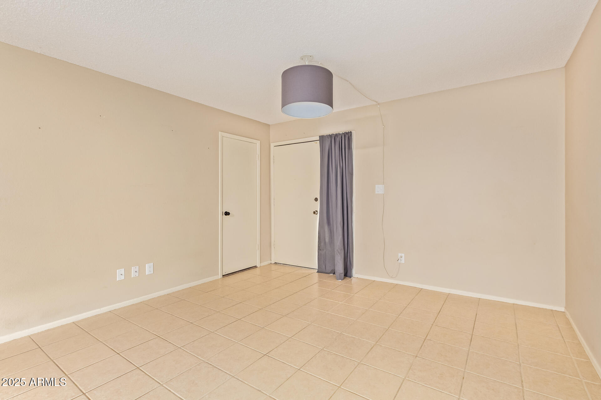 917 South Acapulco Lane, Unit C Tempe, AZ 85288 - Photo 13 of 21 a view of an empty room